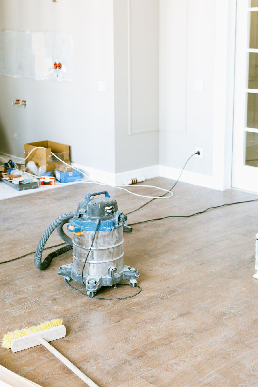 Cleaning equipment in a room undergoing post-construction cleanup